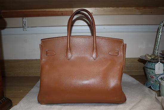 A Hermes tan leather Birkin handbag, with dust bag (puchased 1998 from Paris store) Width 35cm